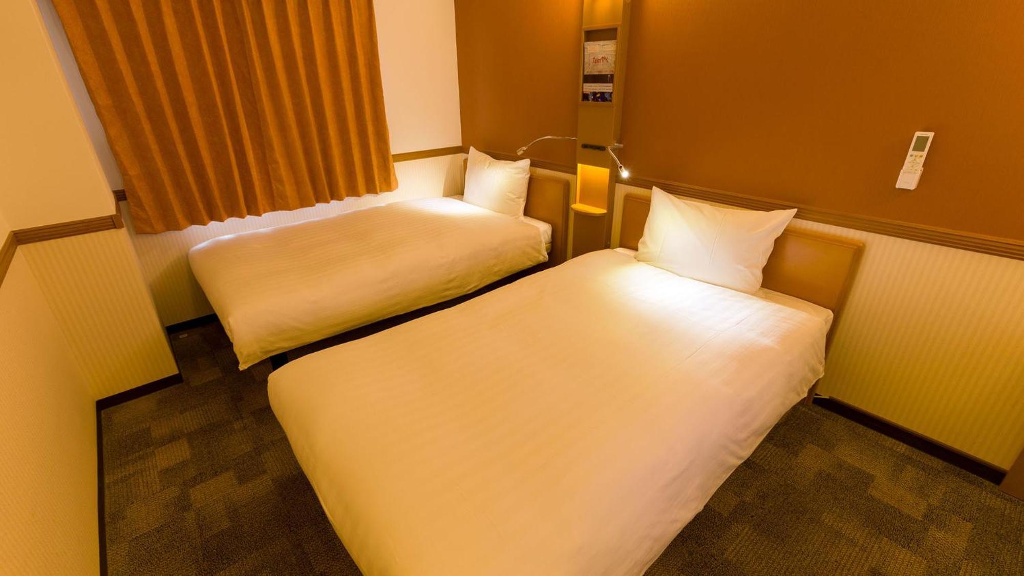 Toyoko Inn Sendai Nishi-Guchi Hirose-Dori Rum bild